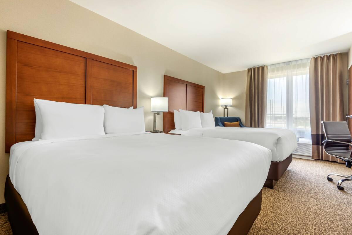 standard room, 2 queen beds, non smoking | premium bedding, down duvets, pillow-top beds, desk