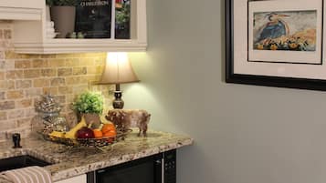 Fridge, microwave, coffee/tea maker, toaster