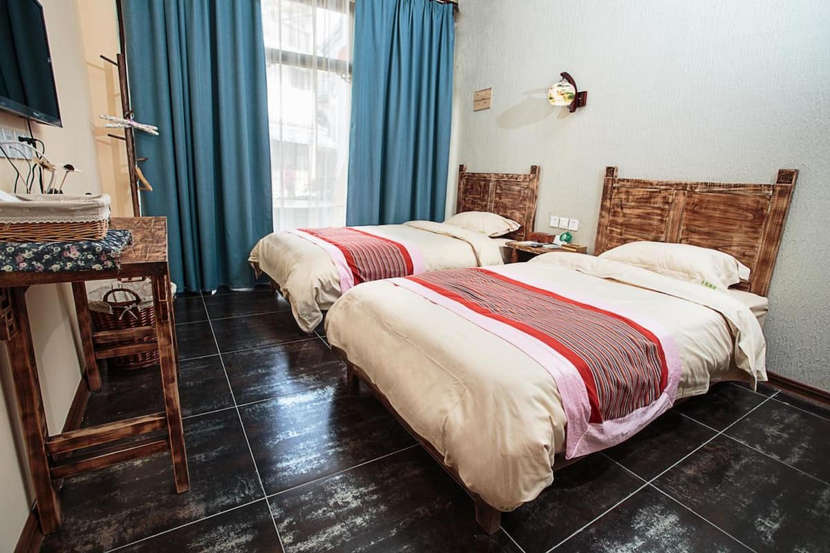 Kamar Twin Deluks | Didekorasi berbeda-beda dan dilengkapi dengan perabotan berbeda-beda