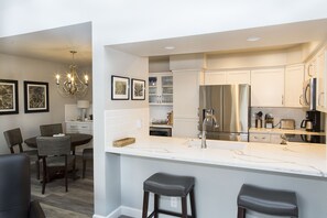 Fridge, microwave, oven, stovetop - Modern top floor corner unit with pool view  (Scottsdale)