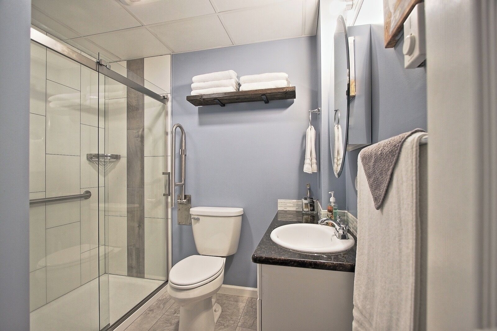Combined shower/tub, hair dryer, towels, soap