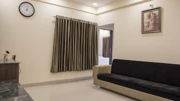 Apartment (1BHK) | Living area | 32-inch TV with satellite channels