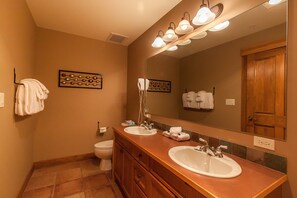 Combined shower/bathtub, hair dryer, towels, soap