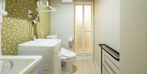 Un baño con lavamanos blanco, inodoro y zona de ducha. La pared presenta un diseño verde y un patrón, y una puerta da a otra habitación.