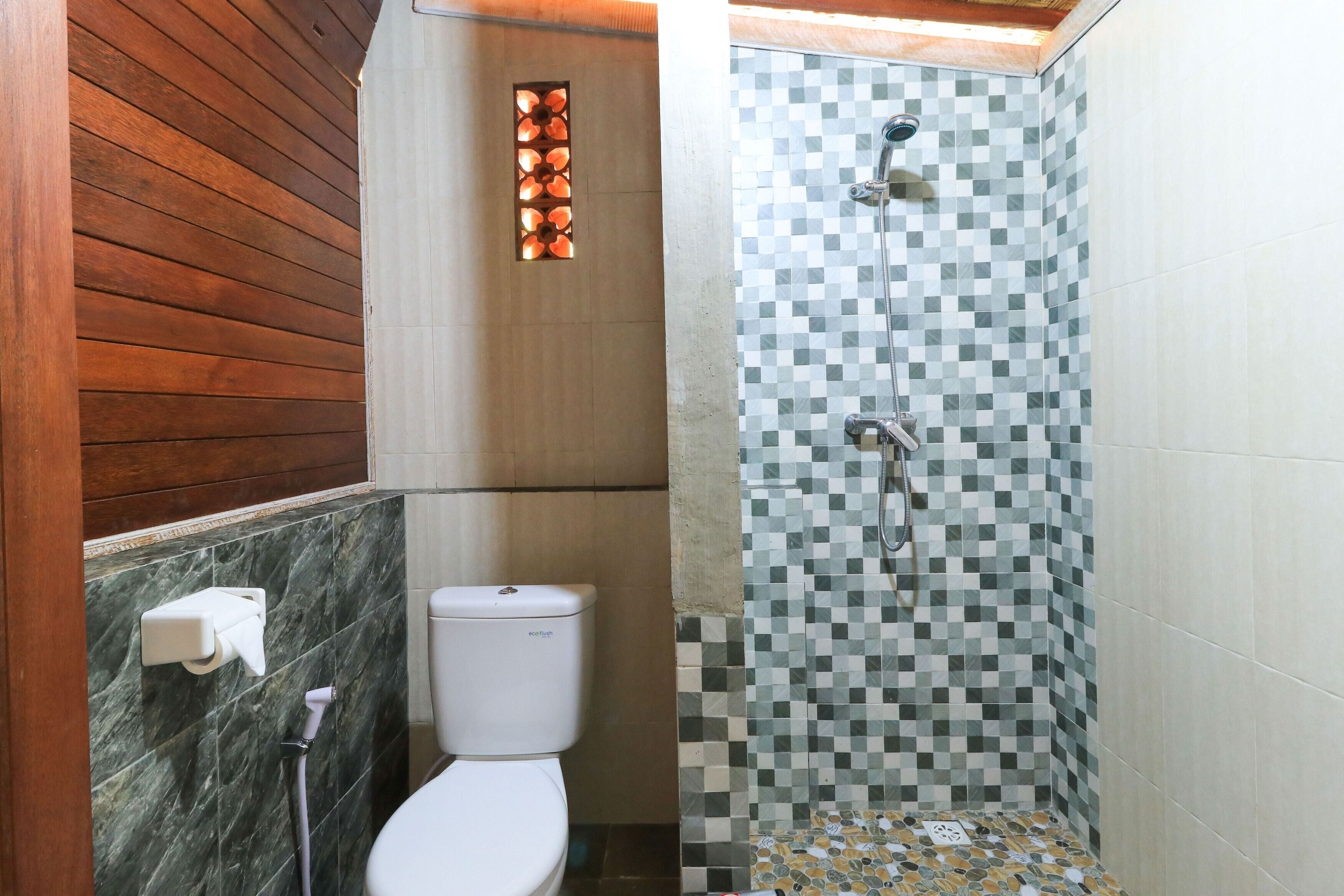 superior bungalow (ac) | bathroom | shower, hydromassage showerhead, free toiletries, towels