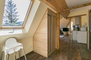 Apartamento conforto (Gabi) | Área de estar | TV de tela plana