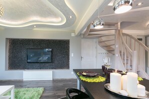 Apartamento luxo (Valentino) | Área de estar | TV de tela plana