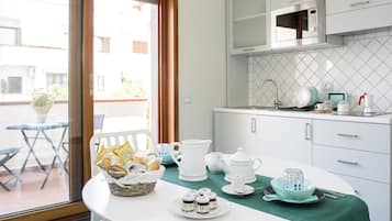 Classic Apartment | Private kitchen | Fridge, microwave, stovetop, electric kettle