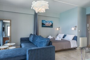 Apartment, Sea View (Third Floor) | Living area | Flat-screen TV