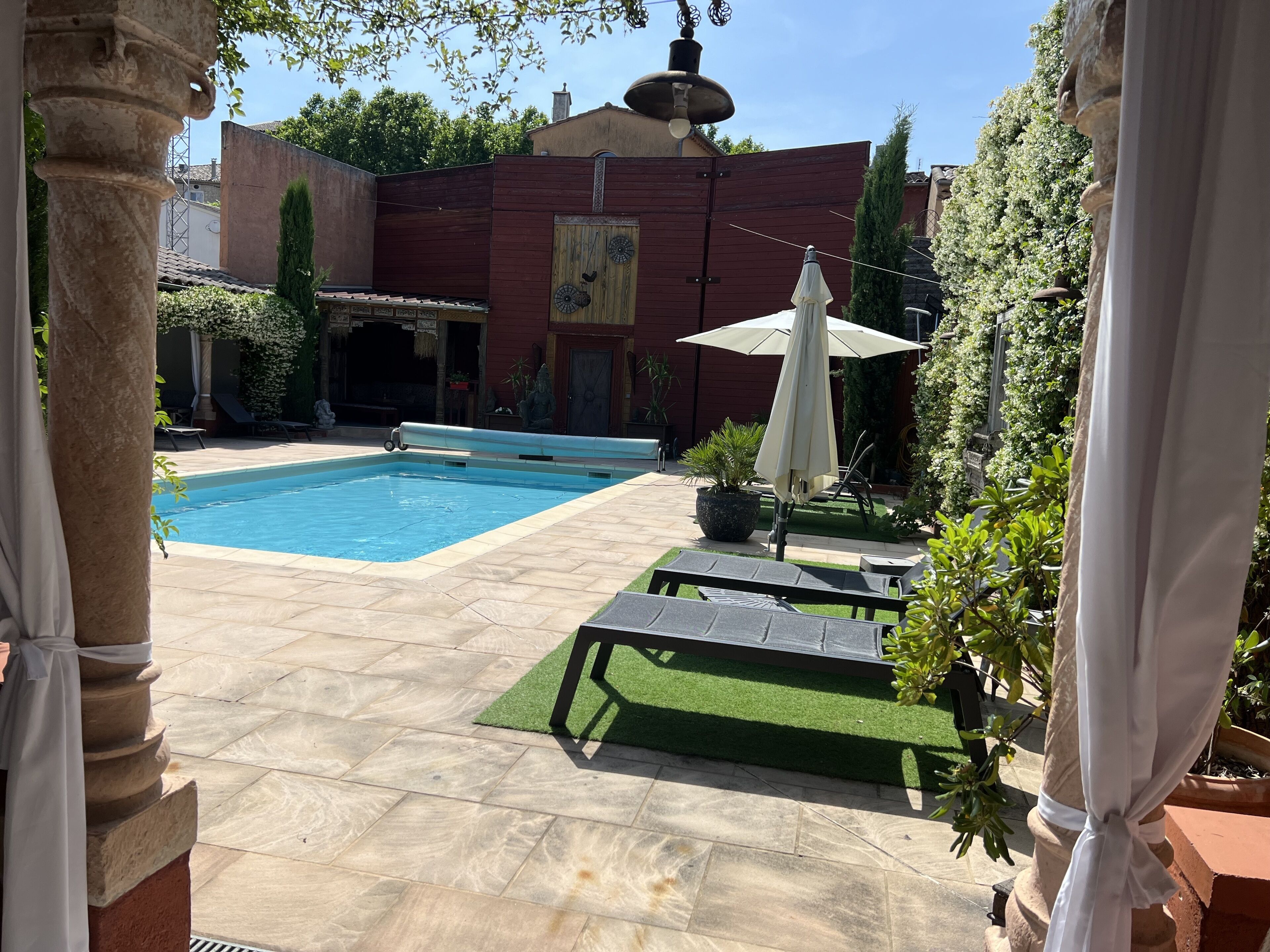 Outdoor pool, pool umbrellas, pool loungers