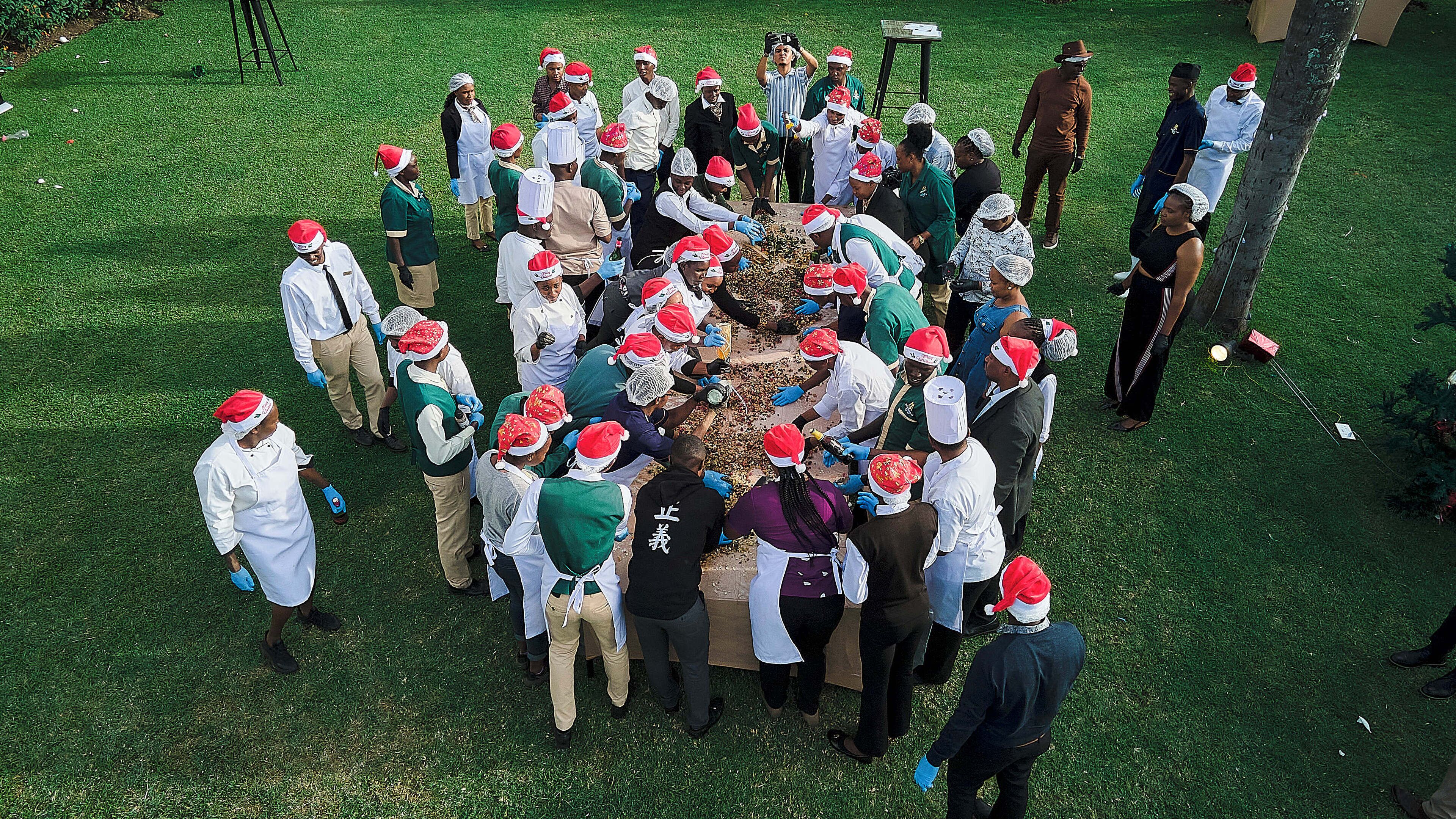 A group of people gathered around a table, possibly for a meal or event.