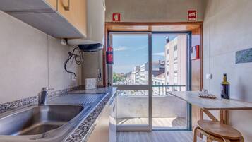 Comfort Room, 1 Bedroom, River View | Private kitchen | Fridge, microwave, stovetop, espresso maker