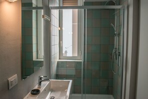 Deluxe Double Room, Balcony, City View (Red) | Bathroom | Shower, hair dryer, slippers, bidet