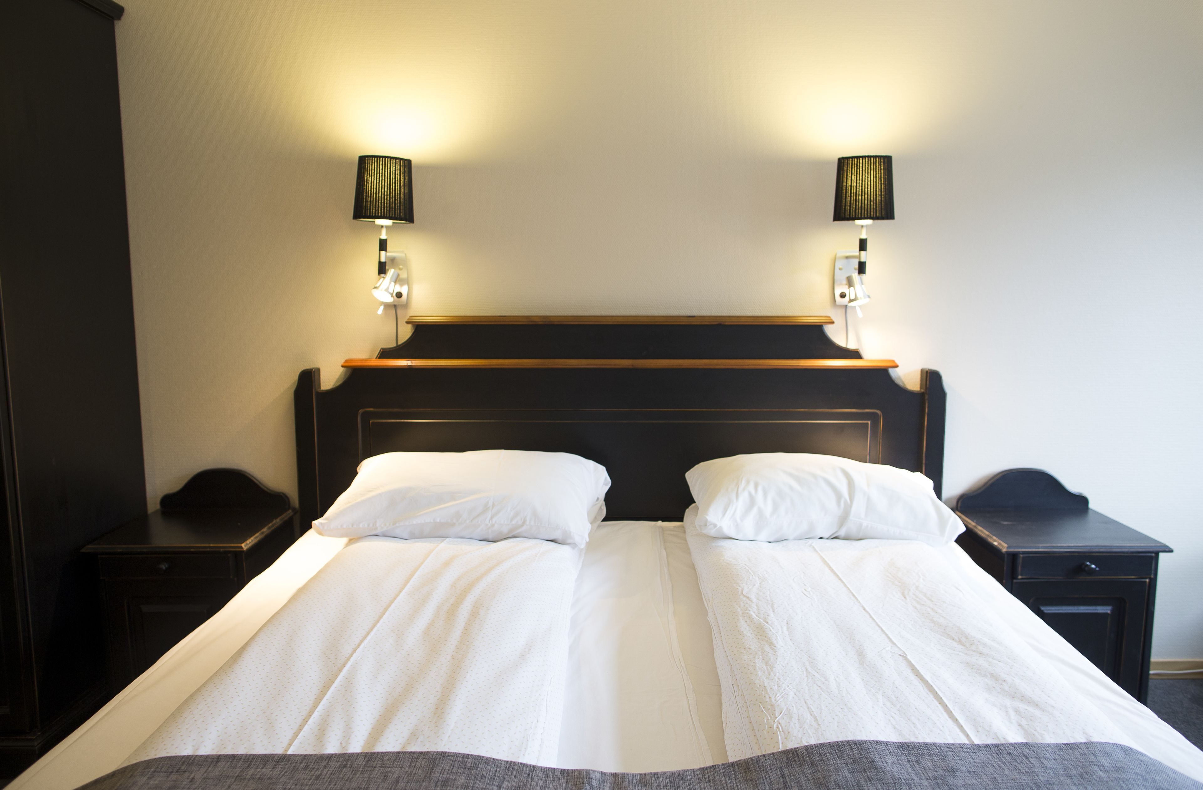 family room | desk, soundproofing, iron/ironing board, cots/infant beds