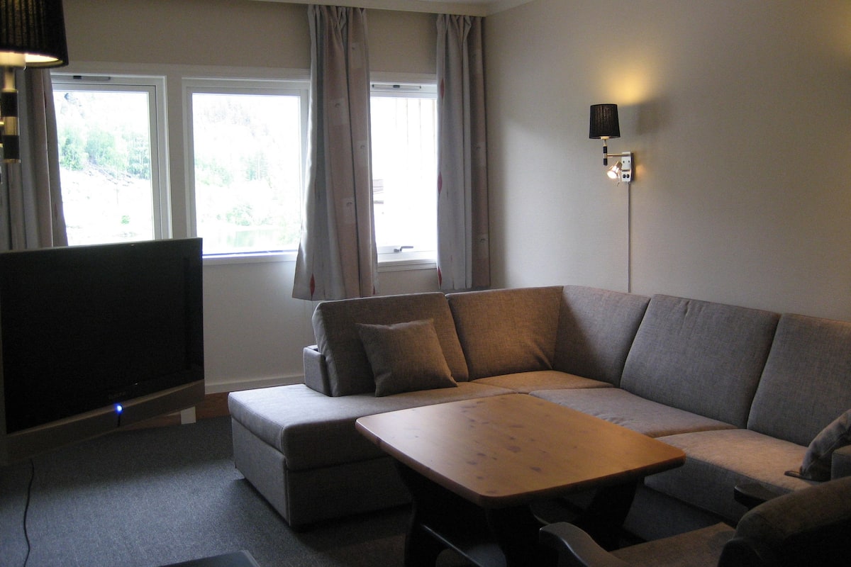 family room | desk, soundproofing, iron/ironing board, cots/infant beds