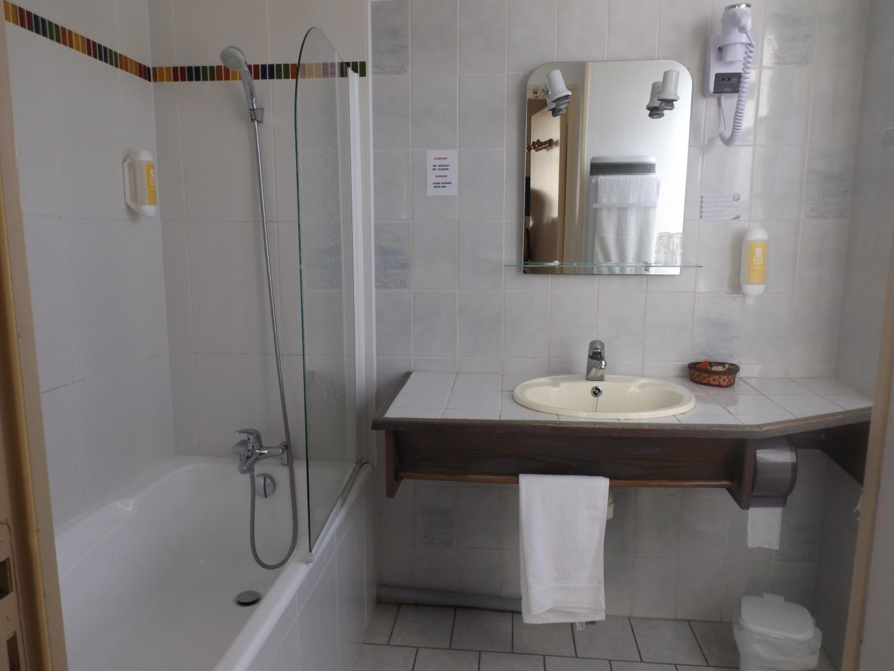 shower, free toiletries, hair dryer, towels