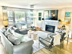 Smart TV, fireplace, books