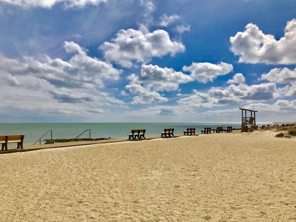 On the beach, sun-loungers, beach towels