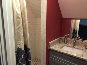 Bathtub, hair dryer, towels, soap