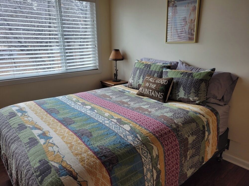 The second first floor bedroom has a queen bed.