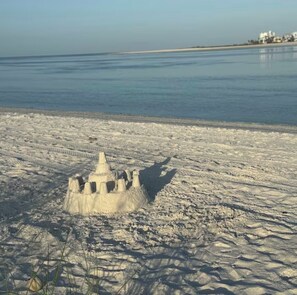 On the beach, sun-loungers