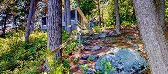 Lakefront cottage with dock, screened porch, & Island in Biscay Pond