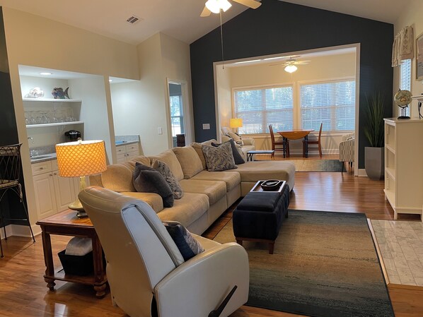 Flat-screen TV, fireplace, DVD player, books
