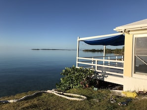 Relax on the waterfront deck with a sheltered area and tranquil views of the surrounding landscape.