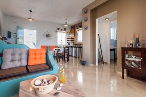 Apartment | Wohnbereich | 22-Zoll-Flachbildfernseher mit Kabelempfang, Fernseher