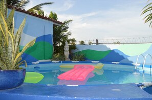 Outdoor pool, pool umbrellas, pool loungers