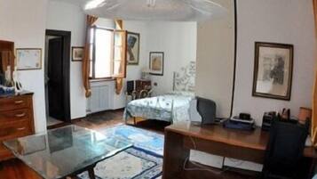 Triple Room | Desk, laptop workspace, blackout drapes, free WiFi