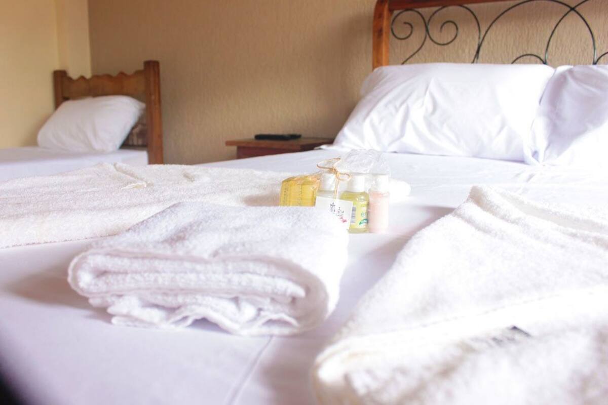 Triple Room, Multiple Beds, Non Smoking, Mountain View | Premium bedding, minibar, free WiFi, bed sheets