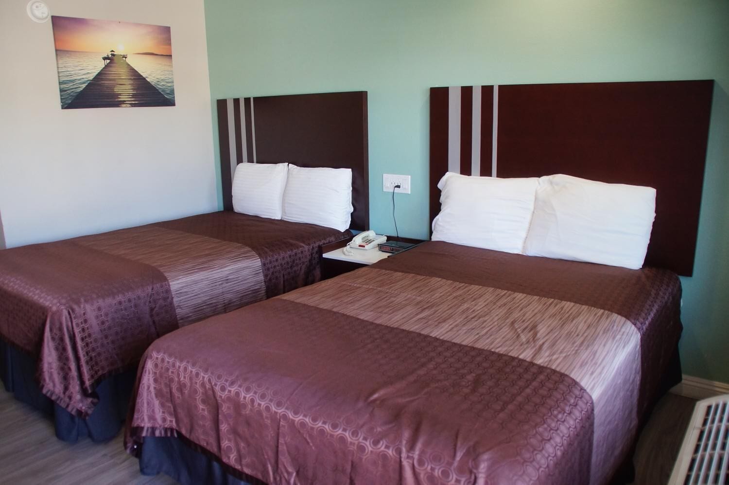 pillow-top beds, desk, laptop workspace, iron/ironing board