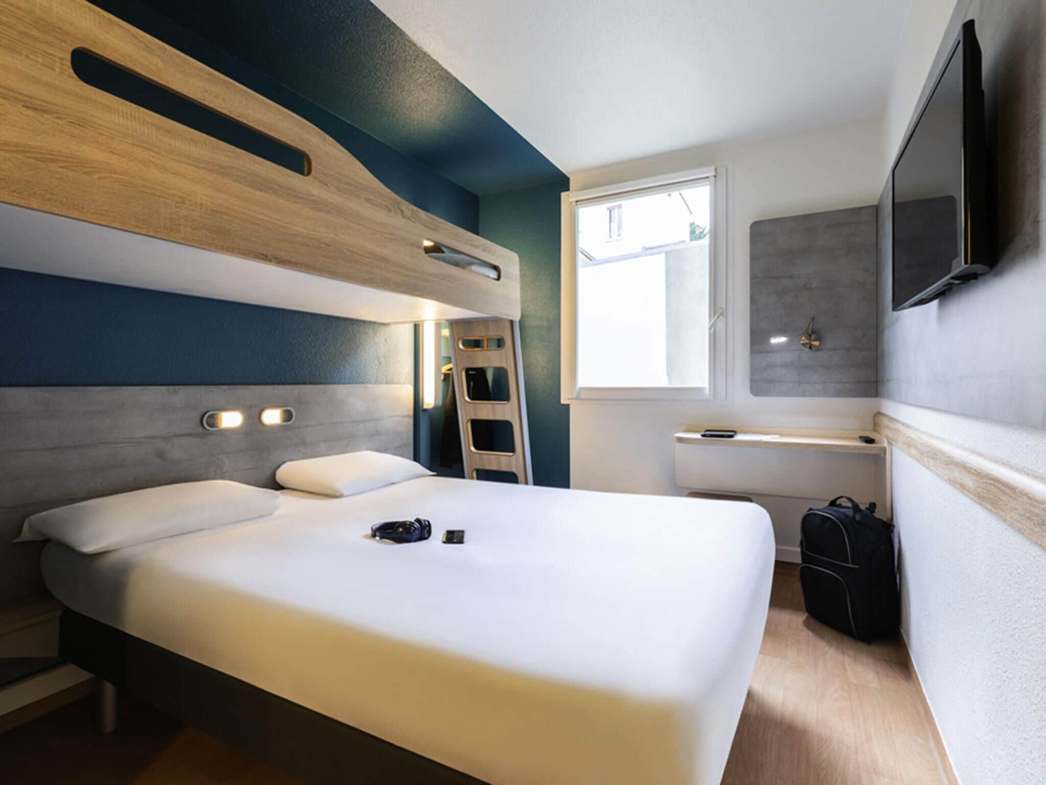 Habitación triple, 1 cama doble | Escritorio, sistema de insonorización, wifi gratis y ropa de cama