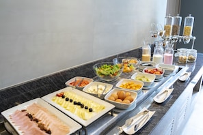 Daily buffet breakfast (USD 15.0 per person)