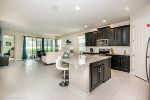 Villa, varias camas | Cocina privada