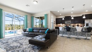 House, Multiple Beds | Living area - Solterra - 4103 Oaktree Drive (Davenport)