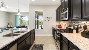 House, Multiple Beds | Private kitchen | Microwave, oven, stovetop, dishwasher - Solterra - 4103 Oaktree Drive (Davenport)