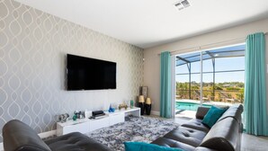 House, Multiple Beds | Living area - Solterra - 4103 Oaktree Drive (Davenport)
