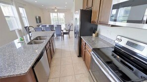 House, Multiple Beds | Private kitchen