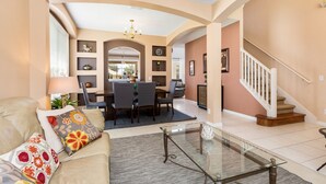 House, 6 Bedrooms | Living area - Emerald Island Resort - 8517 Sunrise Key Drive (Kissimmee)
