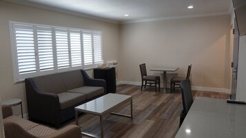 Family Room, Multiple Beds, Non Smoking | Living room | TV