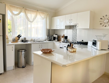 Fridge, microwave, oven, stovetop. Bright & Beautiful Home on the Hills!