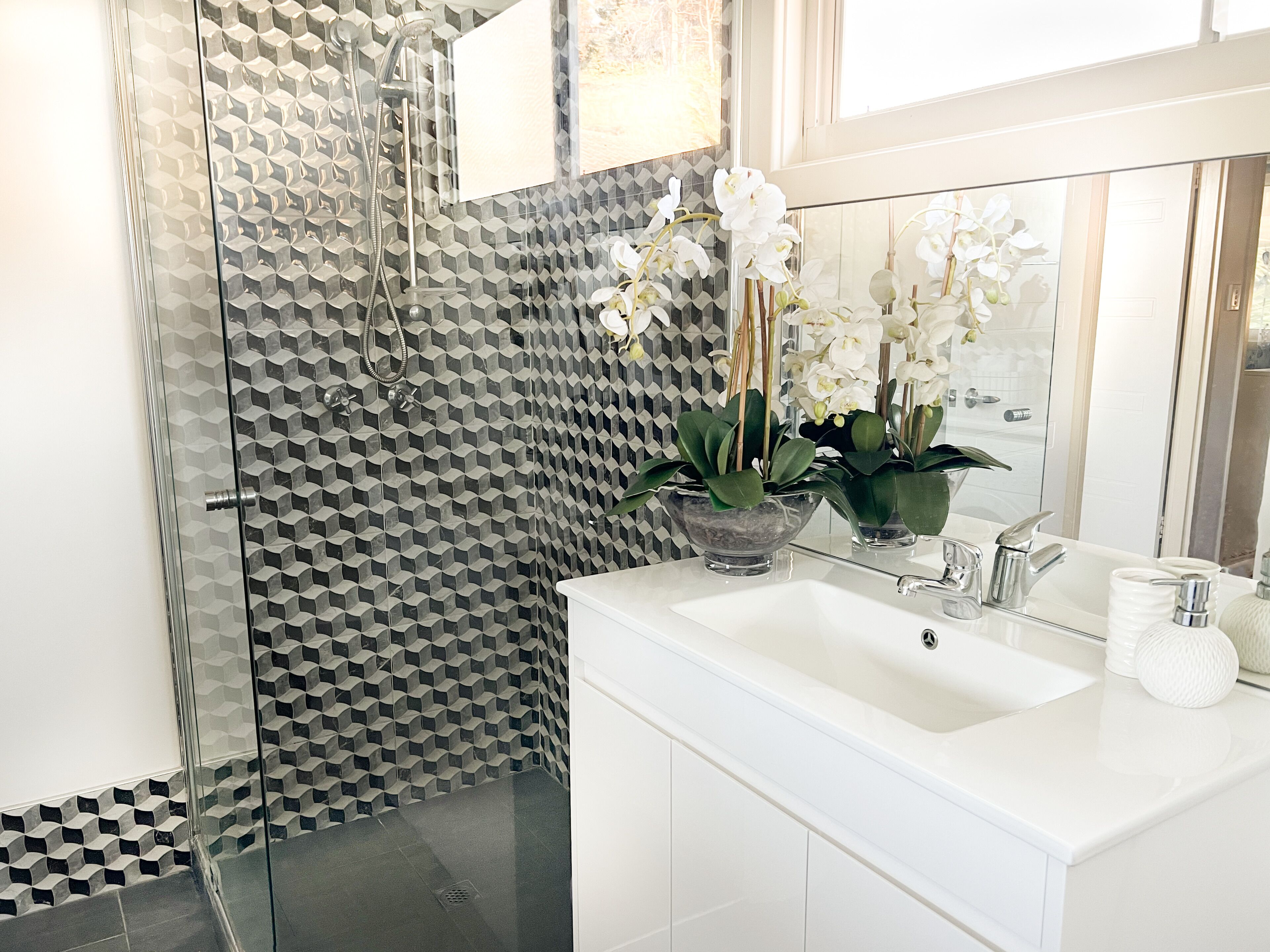 Shower, hair dryer, slippers, towels