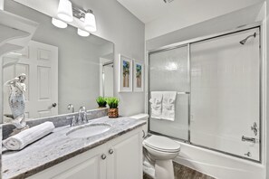 Combined shower/bathtub, hair dryer, towels, soap