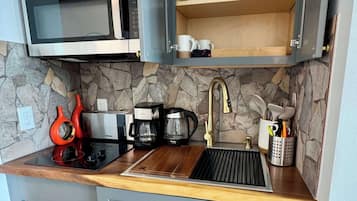 Fridge, microwave, stovetop, coffee/tea maker