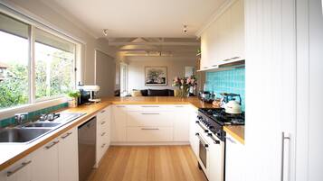 Microwave, dishwasher, coffee/tea maker, cookware/dishes/utensils