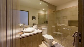 Shower, hair dryer, towels, soap
