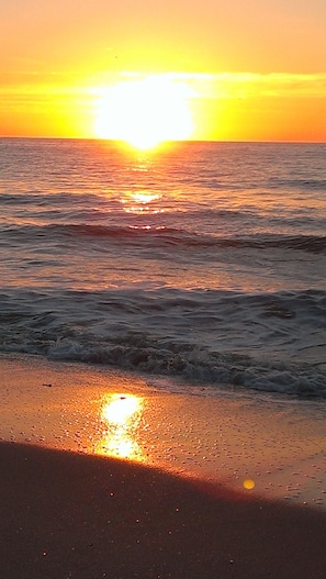 Enjoy serene beach views with calm waters and gentle waves.