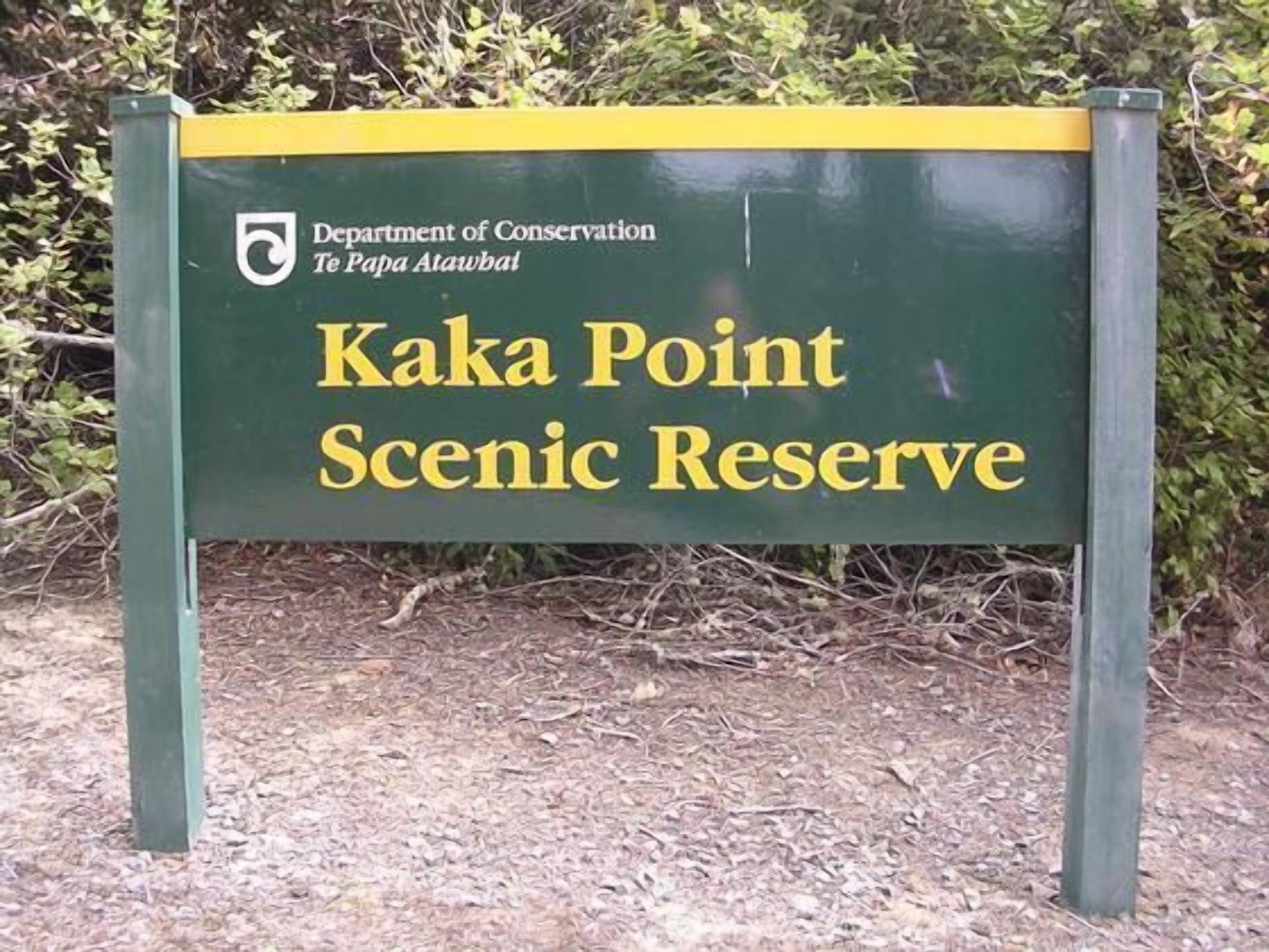 A sign for Kakapoint Scenic Reserve by the Department of Conservation.